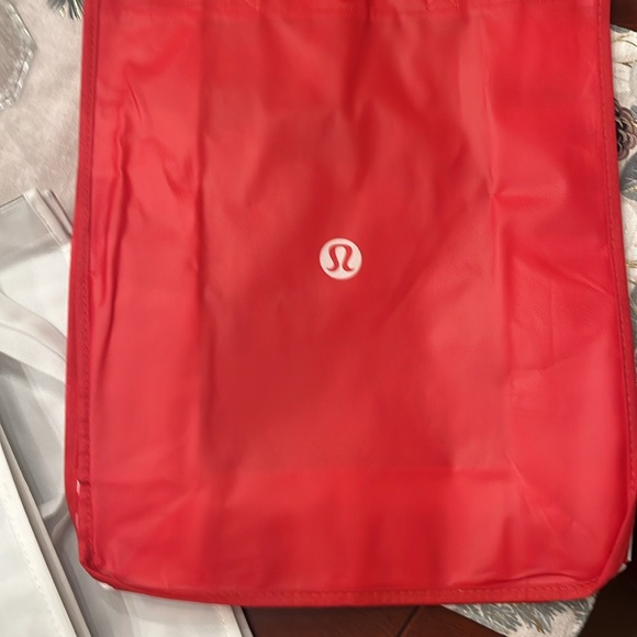 Three medium lululemon shopping bags. Great for packing gifts - Picture 3 of 3